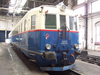 E081