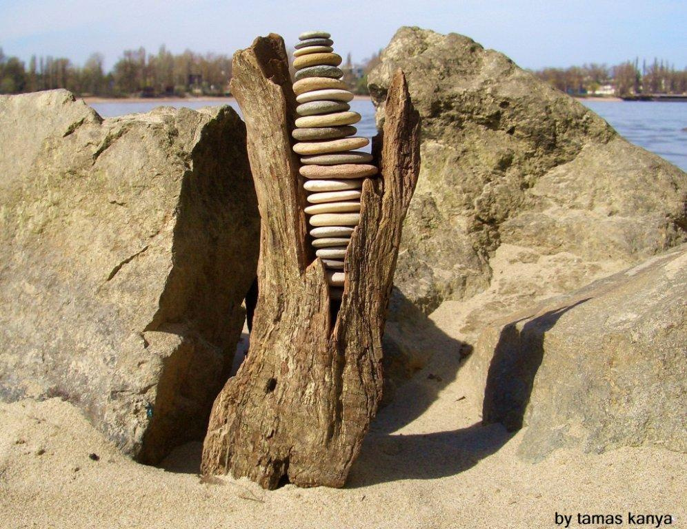 driftwood art(stone balance) in hungary by tamas kanya