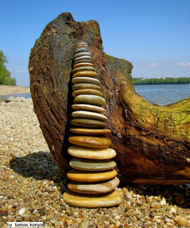 Driftwood and stone balance in hungary by tamas kanya