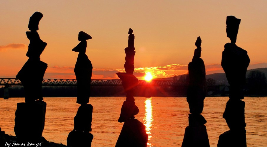 Stone balance composition in the sunset in Hungary by tamas kany