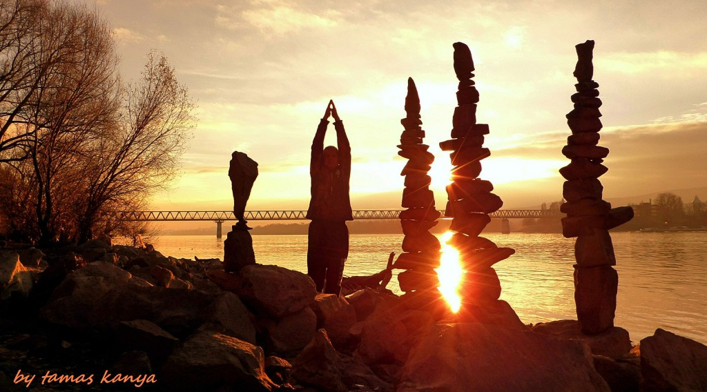 Stone balance silhouette game in the sunset(Hungary)by tamas kan