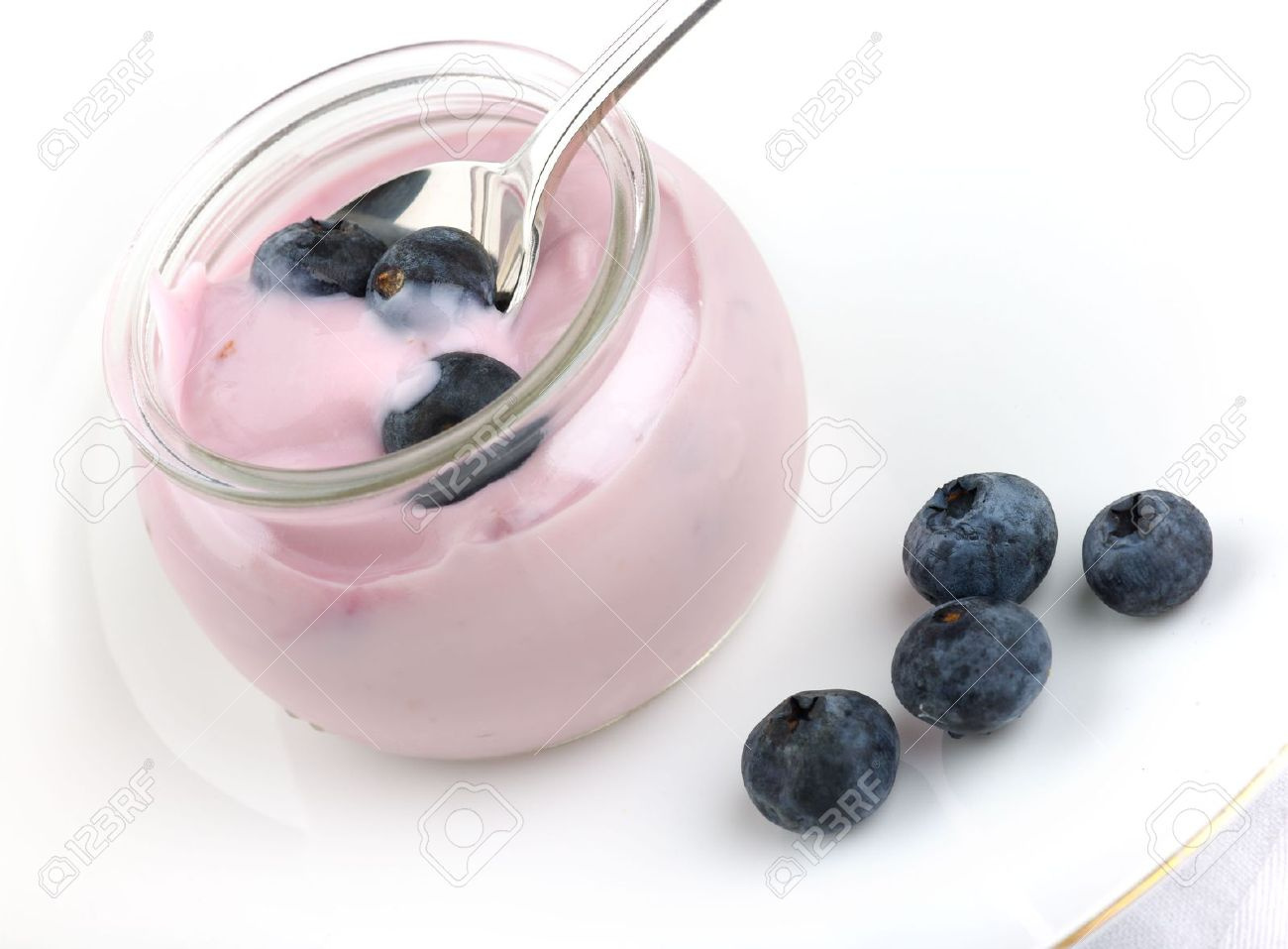 2133644-Fresh-fruit-yogurt-with-blueberries-high-key-Stock-Photo