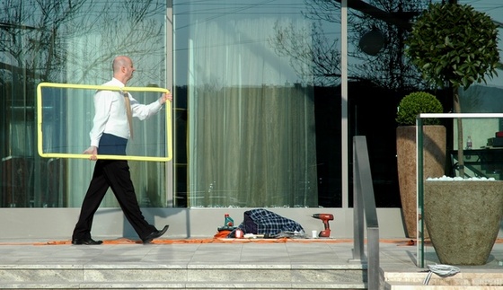 man with yellow square