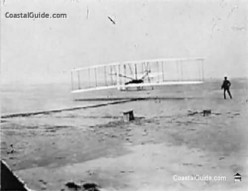 First flight, Dec. 17, 1903. Distance, 120 feet. Time, 12 second