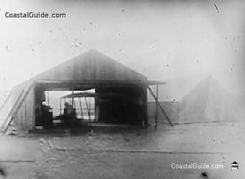 Frame building and tent, Kill Devil Hills, 1901.