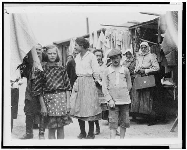 People, including children, in market, Hungary 1920-23