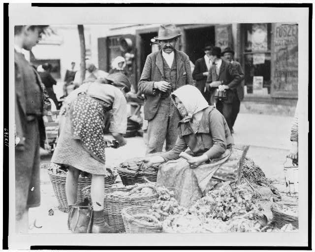 Woman selling produce in market, Hungary 1920-23