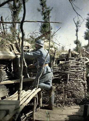 1917 Frontline trench, observer. French serviceman at work in th