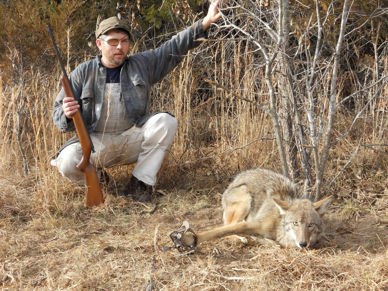 pic - trapping, 2011, Greg with coyote,