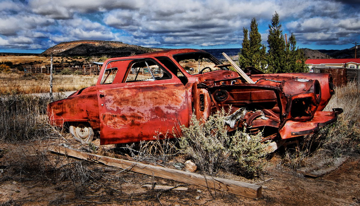 an-abandoned-car-on-the-side-of-route-66-in-pueblo-of-laguna-new