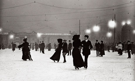 Ice skating by night in Vienna circa 1910.