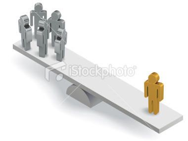 istockphoto 16130423-stick-men-balance-gold-man